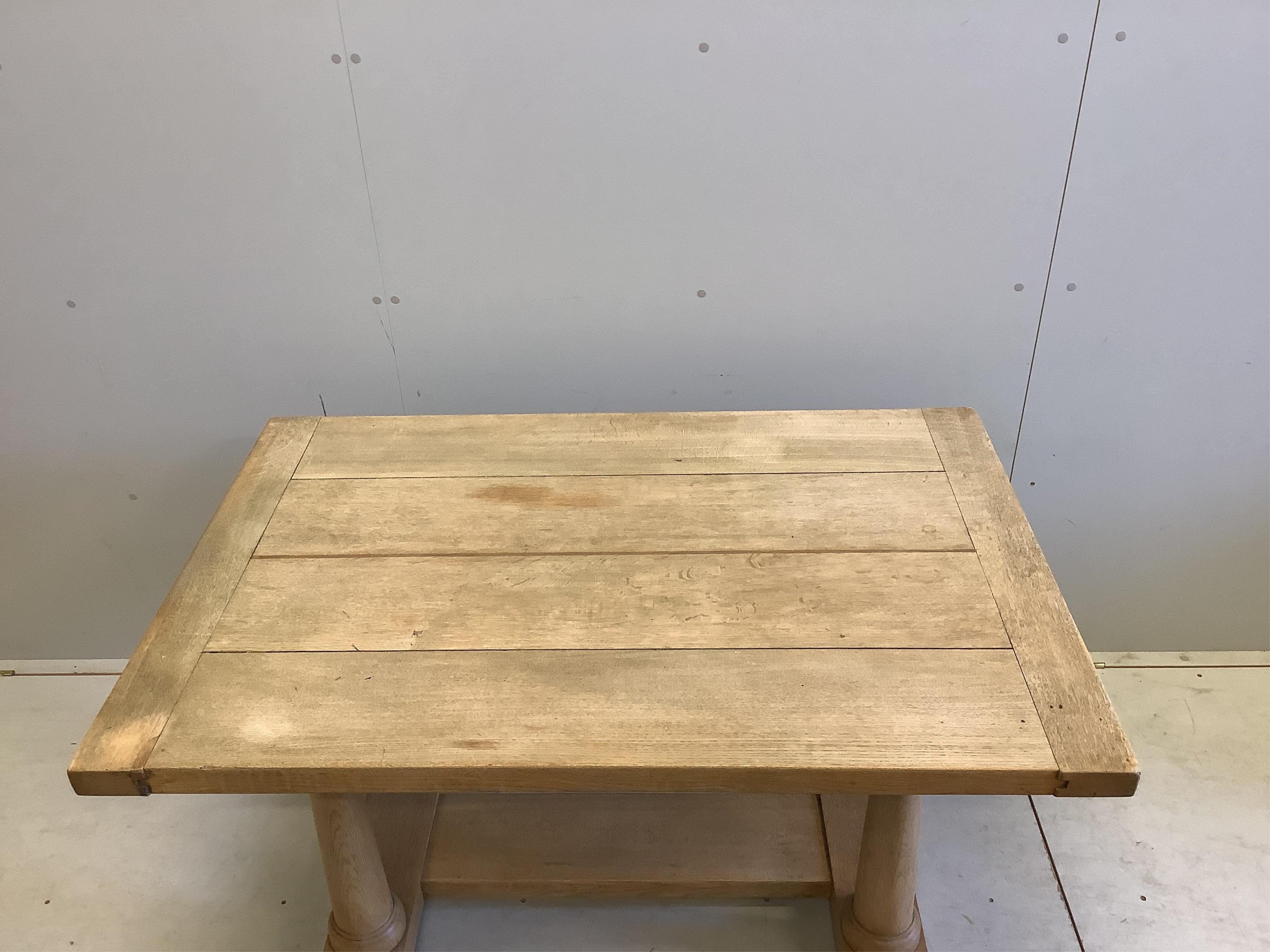 An 18th century style rectangular bleached oak refectory dining table, width 129cm, depth 86cm, height 73cm. Condition - fair